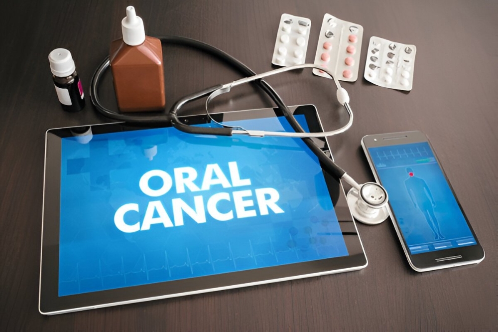 Dentist performing oral cancer screening in Naples, FL